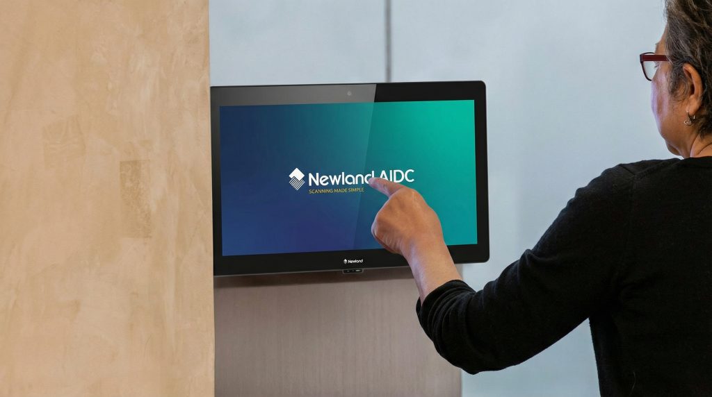 person using a NQuire micro kiosk
